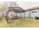 Spacious backyard area with a picnic table, offering a great space for outdoor activities and enjoyment at 559 Eagle Dr, Daytona Beach, FL 32117