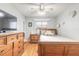 Charming bedroom with wood floors, a decorative dresser, and a comfortable bed, providing a cozy retreat at 559 Eagle Dr, Daytona Beach, FL 32117