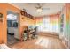 Versatile bonus room with unique decor, bright lighting, and ample space for flexible living or office use at 559 Eagle Dr, Daytona Beach, FL 32117