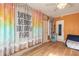 Bright bonus room with fun decor and exterior access at 559 Eagle Dr, Daytona Beach, FL 32117