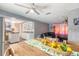 Kitchen and dining area with wood table and view of living room at 559 Eagle Dr, Daytona Beach, FL 32117