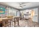 Charming kitchen and breakfast nook with stainless steel appliances and beachy decor at 559 Eagle Dr, Daytona Beach, FL 32117
