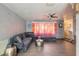 Comfortable living room featuring a large sectional sofa and modern decor at 559 Eagle Dr, Daytona Beach, FL 32117