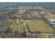 Aerial view of property showing house, pool, and large yard at 601 Rasley Rd, New Smyrna Beach, FL 32168