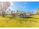 Large backyard with above ground pool and deck at 601 Rasley Rd, New Smyrna Beach, FL 32168