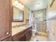 Updated bathroom with walk-in shower and vanity at 601 Rasley Rd, New Smyrna Beach, FL 32168
