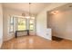 Bright dining room with bay window and wood flooring at 601 Rasley Rd, New Smyrna Beach, FL 32168