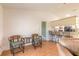 Living area with hardwood floors and built-in bar at 601 Rasley Rd, New Smyrna Beach, FL 32168
