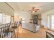 Spacious living room features a stone fireplace and hardwood floors at 601 Rasley Rd, New Smyrna Beach, FL 32168