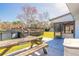Screened patio with wooden deck and picnic table at 601 Rasley Rd, New Smyrna Beach, FL 32168