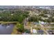 Aerial view showing home's location near a pond and other houses at 639 Florida Ave, Daytona Beach, FL 32117