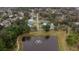 Aerial view of the neighborhood with a pond as a central feature at 639 Florida Ave, Daytona Beach, FL 32117
