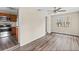 Bright dining area with wood-look floors and kitchen access at 639 Florida Ave, Daytona Beach, FL 32117