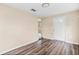 Bright entryway with wood-look floors and view to the living area at 639 Florida Ave, Daytona Beach, FL 32117