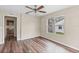 Living room with laminate wood floors and backyard view at 639 Florida Ave, Daytona Beach, FL 32117