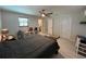 Comfortable bedroom featuring a ceiling fan and two closets at 744 Baywood Ln, South Daytona, FL 32119