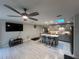 Open concept kitchen with a large island and gray cabinets at 744 Baywood Ln, South Daytona, FL 32119