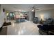 Modern kitchen with gray cabinets, an island, and stainless steel appliances at 744 Baywood Ln, South Daytona, FL 32119