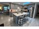 Updated kitchen with gray cabinets and a large kitchen island at 744 Baywood Ln, South Daytona, FL 32119