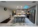 Modern kitchen with gray cabinets, granite countertops, and island at 744 Baywood Ln, South Daytona, FL 32119