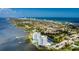 Aerial view of waterfront property, pool, and city skyline at 925 N Halifax Ave # 1001, Daytona Beach, FL 32118