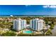 Aerial view of waterfront property with pool at 925 N Halifax Ave # 1001, Daytona Beach, FL 32118