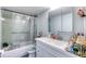 Clean bathroom with shower and vanity at 925 N Halifax Ave # 1001, Daytona Beach, FL 32118