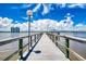 Wooden pier extending into the water at 925 N Halifax Ave # 1001, Daytona Beach, FL 32118