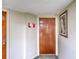 Apartment entryway with wood door at 925 N Halifax Ave # 1001, Daytona Beach, FL 32118