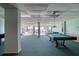 Game room with pool table and foosball table at 925 N Halifax Ave # 1001, Daytona Beach, FL 32118