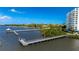 Aerial view of waterfront property with pier access at 925 N Halifax Ave # 1001, Daytona Beach, FL 32118