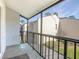 Private screened balcony offers tranquil outdoor space at 100 E Kentucky Ave # K106, Deland, FL 32724