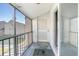 Screened balcony overlooks community with partial view at 100 E Kentucky Ave # K106, Deland, FL 32724