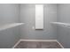 Large walk-in closet with wire shelving and built-in storage at 100 E Kentucky Ave # K106, Deland, FL 32724