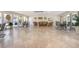 Spacious community room with seating and tables at 100 E Kentucky Ave # K106, Deland, FL 32724
