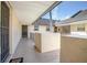 Exterior walkway leads to building entrance with stairs at 100 E Kentucky Ave # K106, Deland, FL 32724