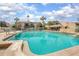 Community pool with ample deck space for lounging at 100 E Kentucky Ave # K106, Deland, FL 32724