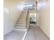 Exterior stairwell accesses upper units of building at 100 E Kentucky Ave # K106, Deland, FL 32724