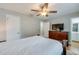 Main bedroom with wood flooring and ceiling fan at 1036 Tompkins Dr, Port Orange, FL 32129
