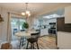 Modern kitchen with stainless steel appliances and white cabinetry at 1036 Tompkins Dr, Port Orange, FL 32129