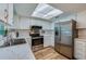 Updated kitchen with stainless steel appliances and marble countertops at 1036 Tompkins Dr, Port Orange, FL 32129