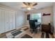 Home office with wood floor and built-in closet at 1036 Tompkins Dr, Port Orange, FL 32129