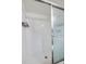 Shower with white tile and glass enclosure at 1036 Tompkins Dr, Port Orange, FL 32129