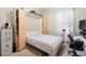 Bedroom with a murphy bed, desk, and window at 1105 Gardenshire Ln, Deland, FL 32724
