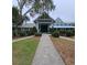 Community clubhouse with brick pathway at 1105 Gardenshire Ln, Deland, FL 32724