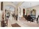 Elegant dining room with a large table and access to the living areas at 1105 Gardenshire Ln, Deland, FL 32724