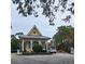Community entrance with guard house at 1105 Gardenshire Ln, Deland, FL 32724