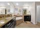 Large bathroom with double vanity, soaking tub, and walk-in shower at 1106 Woods Landing Dr, Minneola, FL 34715
