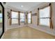 Charming breakfast nook featuring large windows and neutral decor at 1106 Woods Landing Dr, Minneola, FL 34715