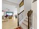 Bright entryway with tile flooring, leading to living room and staircase at 1106 Woods Landing Dr, Minneola, FL 34715